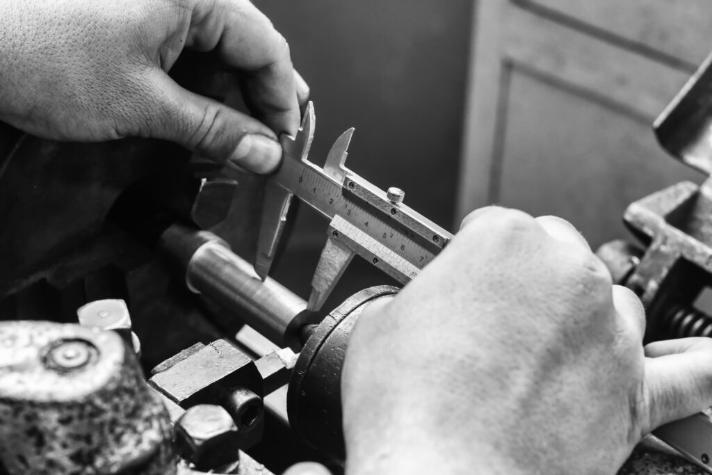 Craftsman assembling tactical self-defense equipment