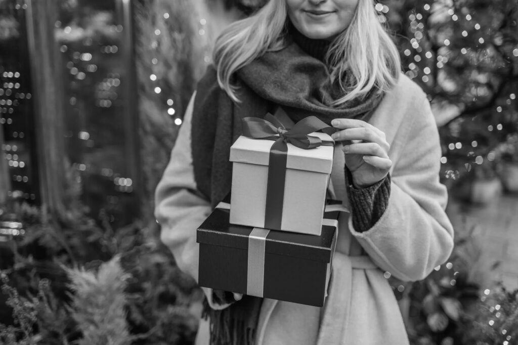 Holiday shopping safety - Woman safely carrying purchases during Black Friday